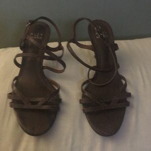 Brown “snakeskin “ kitten heel.